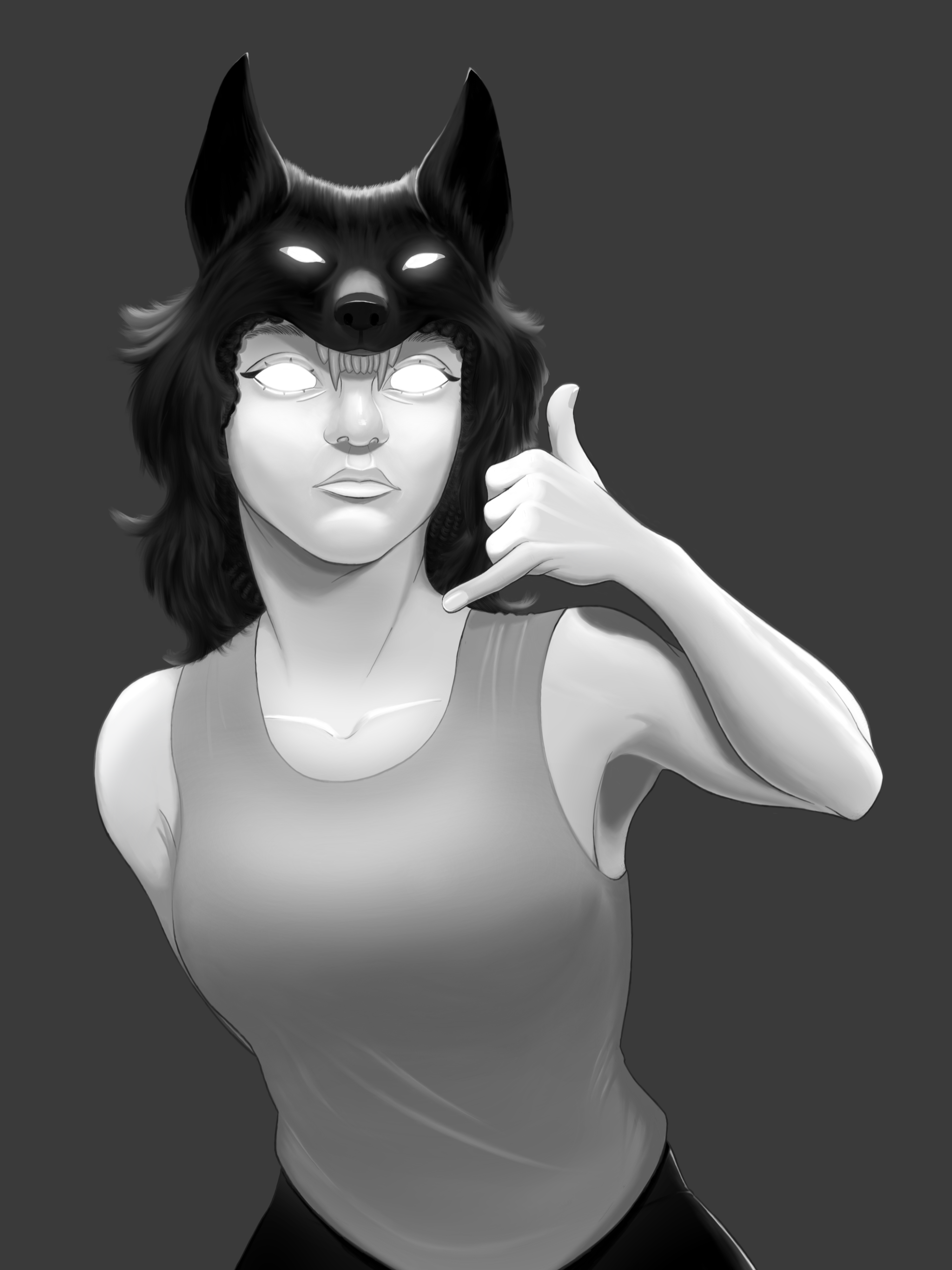 Young woman wearing a wolf headdress and holding her hand in a 'call me' pose.